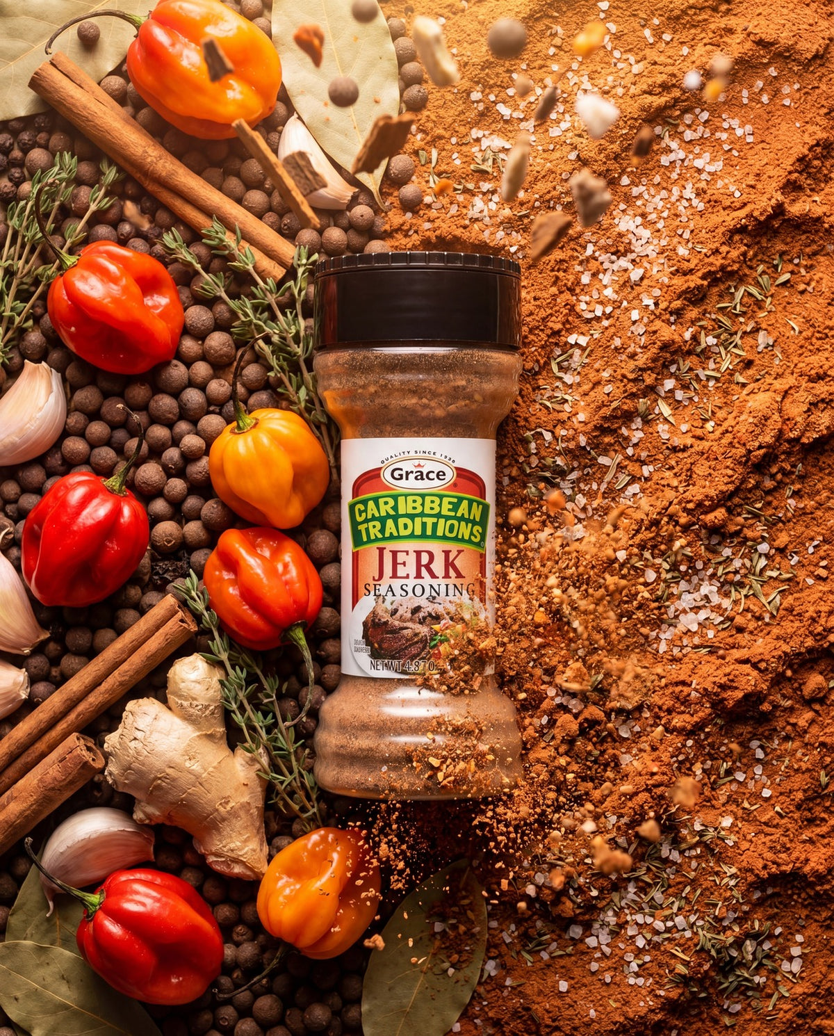 Front view of Grace Caribbean Traditions Jerk Seasoning showcasing its label with peppers and spices in the background