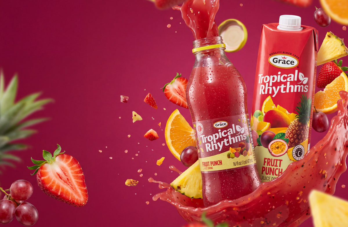 Front view of Tropical Rhythms Fruit Punch juice drink bottles and carton with splashing red punch and tropical fruit
