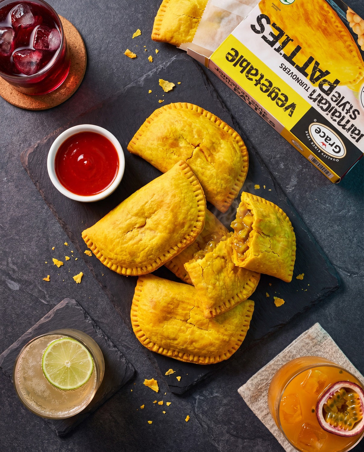Overhead view of Grace Vegetable Jamaican Style Turnover Patties showing flaky crust vegetable filling and box